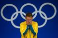 图文-奥运会男子10米跳台决赛 金牌选手掩面而泣
