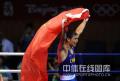 图文-男子拳击81KG张小平夺冠 红旗飘扬在赛场