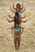  Picture and text: women's beach volleyball Xue Chen/Zhang Xi picking copper beach treasures from various countries