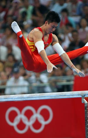 Li Xiaopeng of China wins parallel bars gold medal