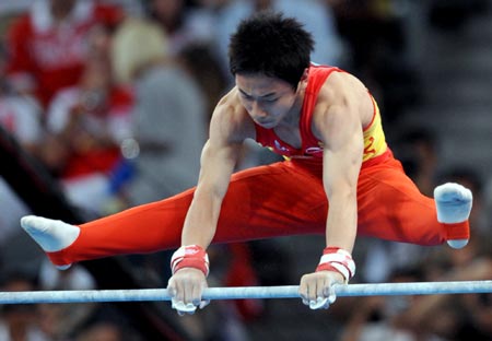 Zou Kai of China wins horizontal gold medal