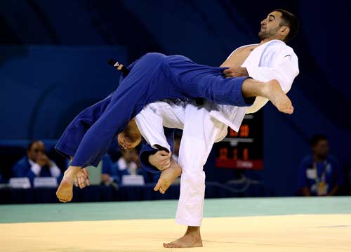 Photo: Men's 60 kg preliminary judo bout