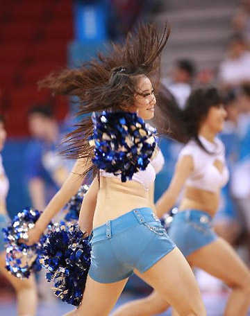 Photo: Cheerleaders warm up women's basketball event