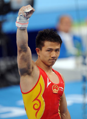 Photos: China wins Men's Gymnastics Team gold at Beijing Olympics