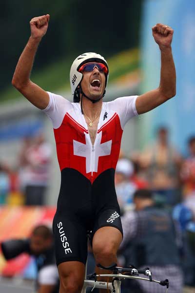 Photo: Cancellara of Switzerland wins Men's Cycling Time Trial gold