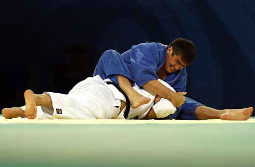 Photo: Naidan from Mongolia wins Men's 100kg Judo gold