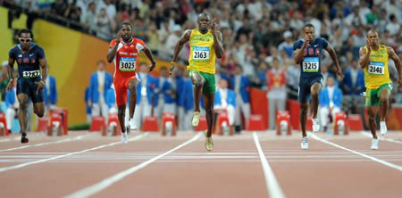 Photo: Bolt breaks world record in 9.69