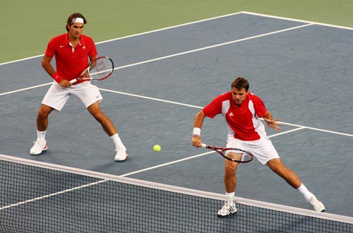 Photo: Federer and Wawrinka win in Men's Doubles