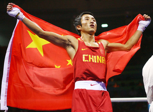 Photo: Zou Shiming of China wins 48kg Boxing gold medal