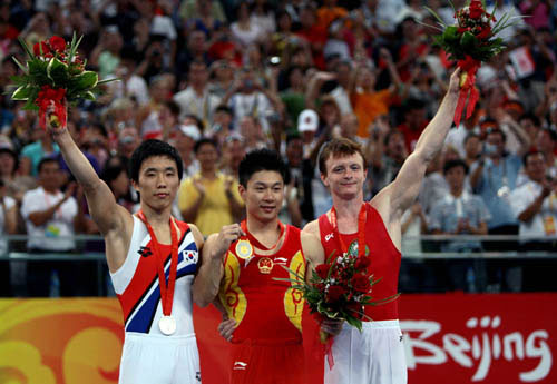 Gymnastique - Barres parallèles : Li Xiaopeng sacré sans étonnement