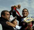 图文-奥运冠军米卢利回到突尼斯 颈挂着金牌