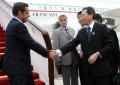 图文-法国总统萨科齐抵京 外交部副部长机场迎接