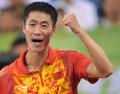 图文-[奥运]乒乓球男单决赛 王励勤挥拳庆祝季军