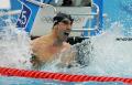 图文-菲尔普斯男子100米蝶泳夺金 怒吼庆祝胜利