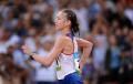  Photo and text - Kanis Gina in the women's 20km track and field walking final