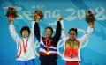 图文-泰选手获女举53公斤级金牌 前三甲合影