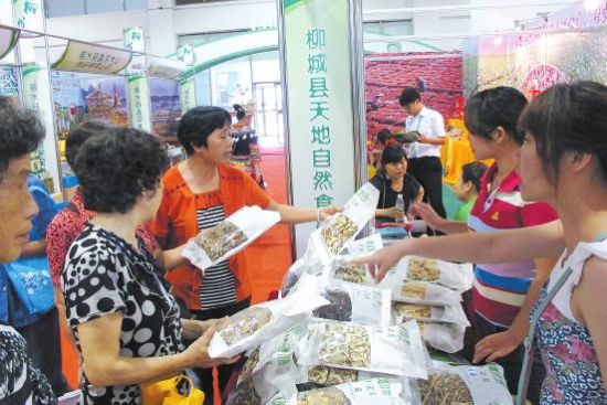 柳州名特优农产品备受青睐 广西名特优农产品交易会 “柳”字号飘香八桂