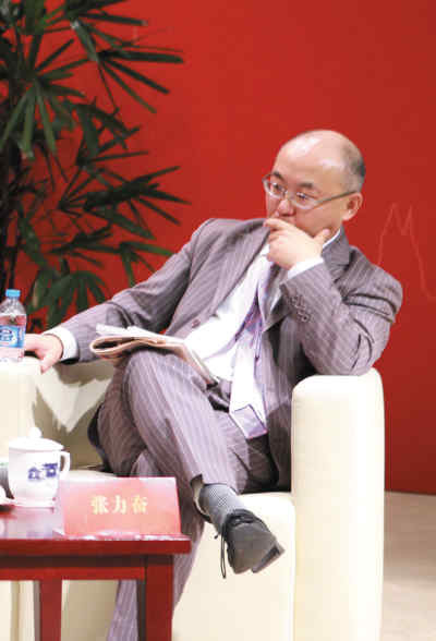 张力奋：应放弃对市场干预