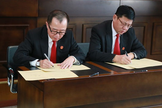 哈尔滨铁路运输法院层层签订责任书推进五项重