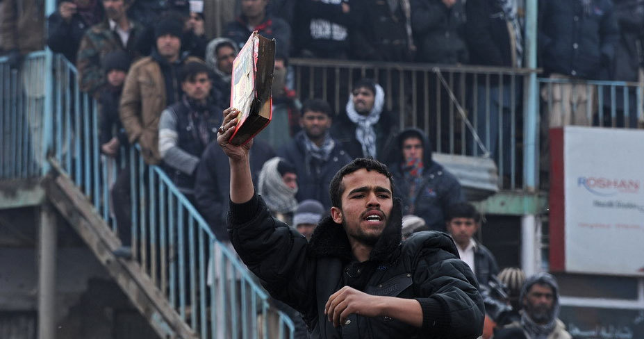 Afghans protest Koran burning at U.S. base
