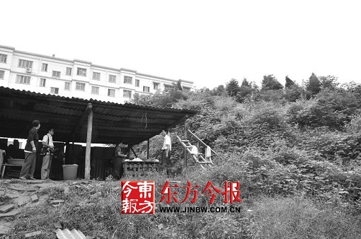 重点文物旁无证盖楼房城建局称违法但无法阻止