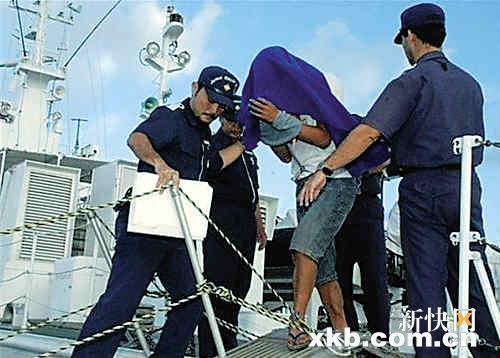 日本放非法抓扣中国船长 宣称保留处罚权