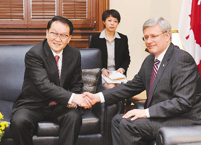 4月19日下午，中共中央政治局常委李长春在渥太华会见加拿大总理哈珀。新华社记者马占成摄