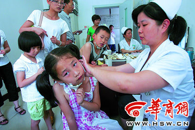 腮腺炎突袭每天百十娃就诊(图)