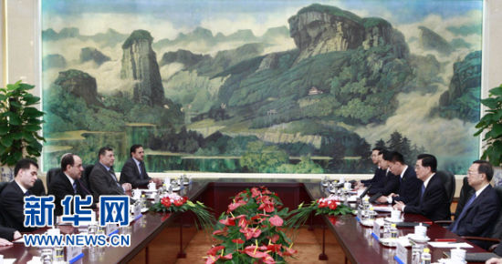7月19日，中国国家主席胡锦涛在北京人民大会堂会见伊拉克总理马利基。 新华社记者 庞兴雷 摄