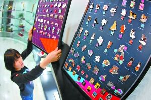 伦敦奥运纪念徽章闪耀北京设计