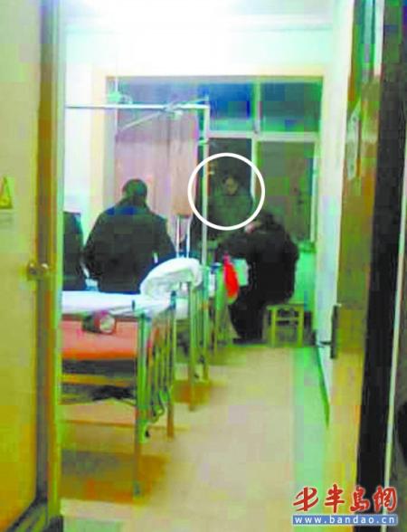 ����������5¥��̨����������һ��ק��(ͼ)