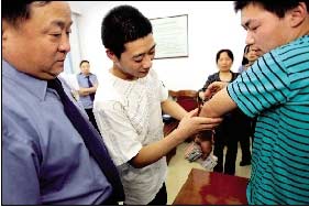 川籍疑犯在京打伤工友被免于起诉(图)
