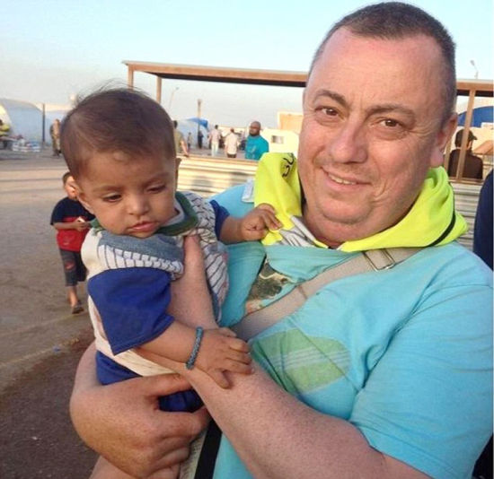 Ӣ˹س⳵˾ԮԱס(Alan Henning)ȥ12·ݱIS֯ܡ