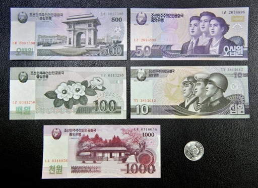 朝鲜更换货币 兑换比率为1比100[2p]