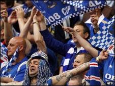 Some football fans at a match