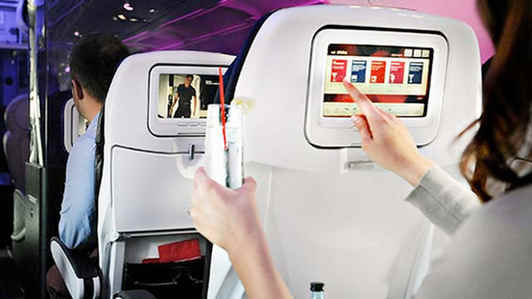 Virgin America has launched a new service that allows people the ability to send drinks, a meal or snack to fellow passengers that catch their eye.