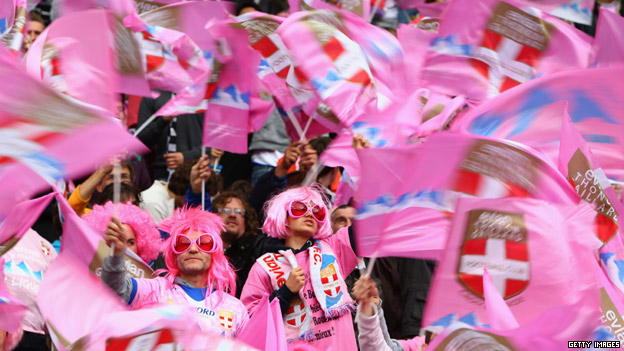 French football fans wearing pink clothes