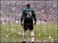 A snowy football match