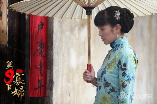 璇《九寡》饰传奇水杯大胆泼辣柔情万种(图)摔女人表情包的图片
