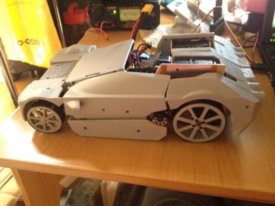 Kenji Ishida's Brave Robot in vehicle form can drive around with steerable wheels