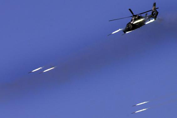 Our army military attire helicopter machine the rocket projectile ball attacks to strike to place item of Biao Jinxing