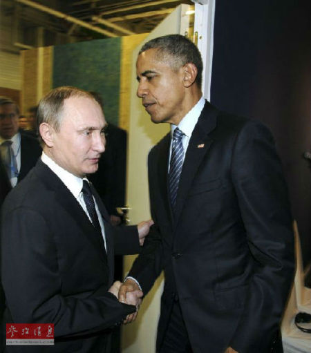 俄罗斯总统普京(左)与美国总统奥巴马11月30日在参加巴黎气候峰会期间举行会谈。(路透社)
