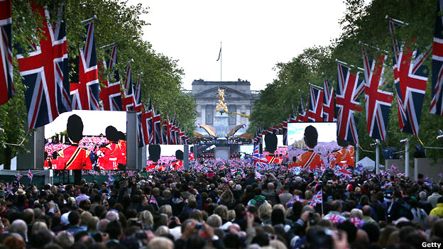A Crowd fills The Mall outside Buckingham Palace, London