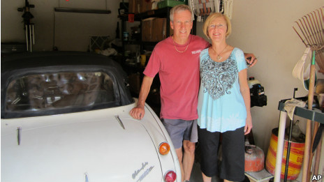 Bob Russell with his wife and long-lost sports car.