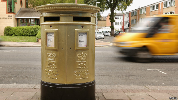 A gold post box in Isleworth, London. 
