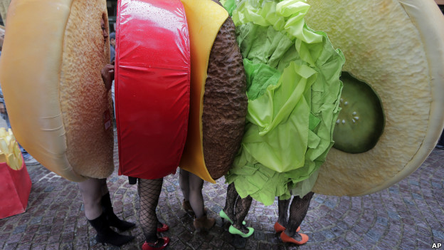 A group of youngsters, dressed up as a sandwich, in a fancy dress march during a Halloween event in Kawasaki, near Tokyo. 