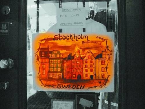 The shop door painted the old city of Stockholm