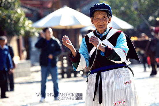 Sina travel pictures: Naxi granny Photography: Li Shuangxi