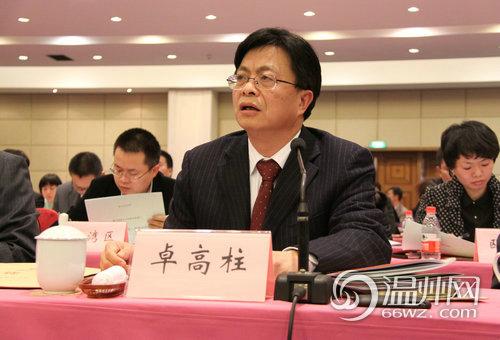 图:市人大副主任卓高柱点评市侨办