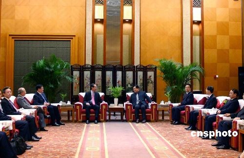 图:四川省长蒋巨峰会见唐英年一行